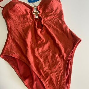 NWT Orange one piece with front rings
